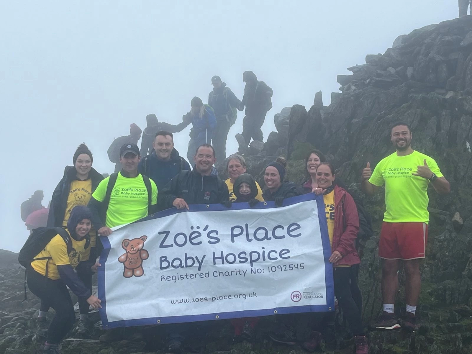 Staff from The Wigley Group at the top of Mount Snowdon