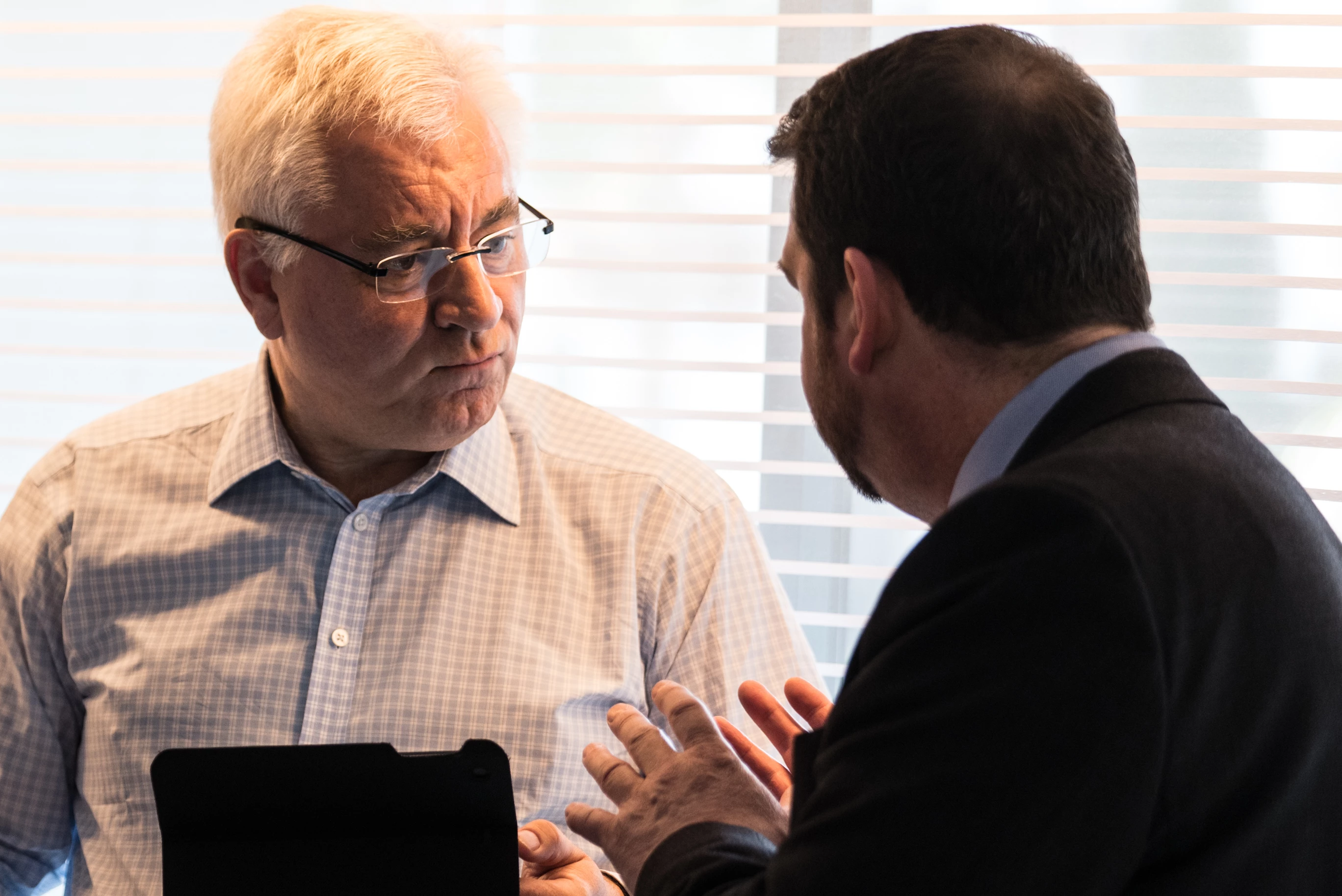 Sir Nigel Knowles, Chairman of the Sheffield City Region Local Enterprise Partnership (LEP) talking to a delegate at MIPIM 2017.