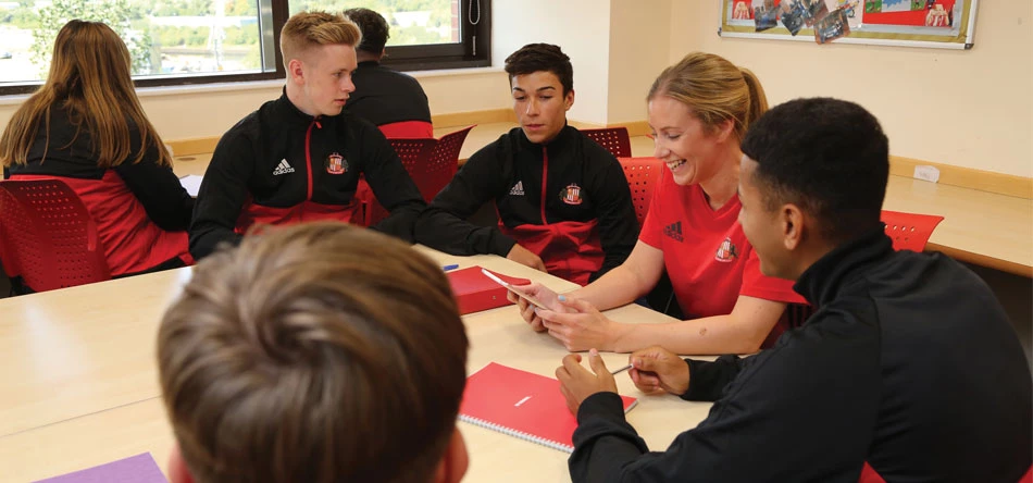 Aspiring coaches and players taking part in education sessions