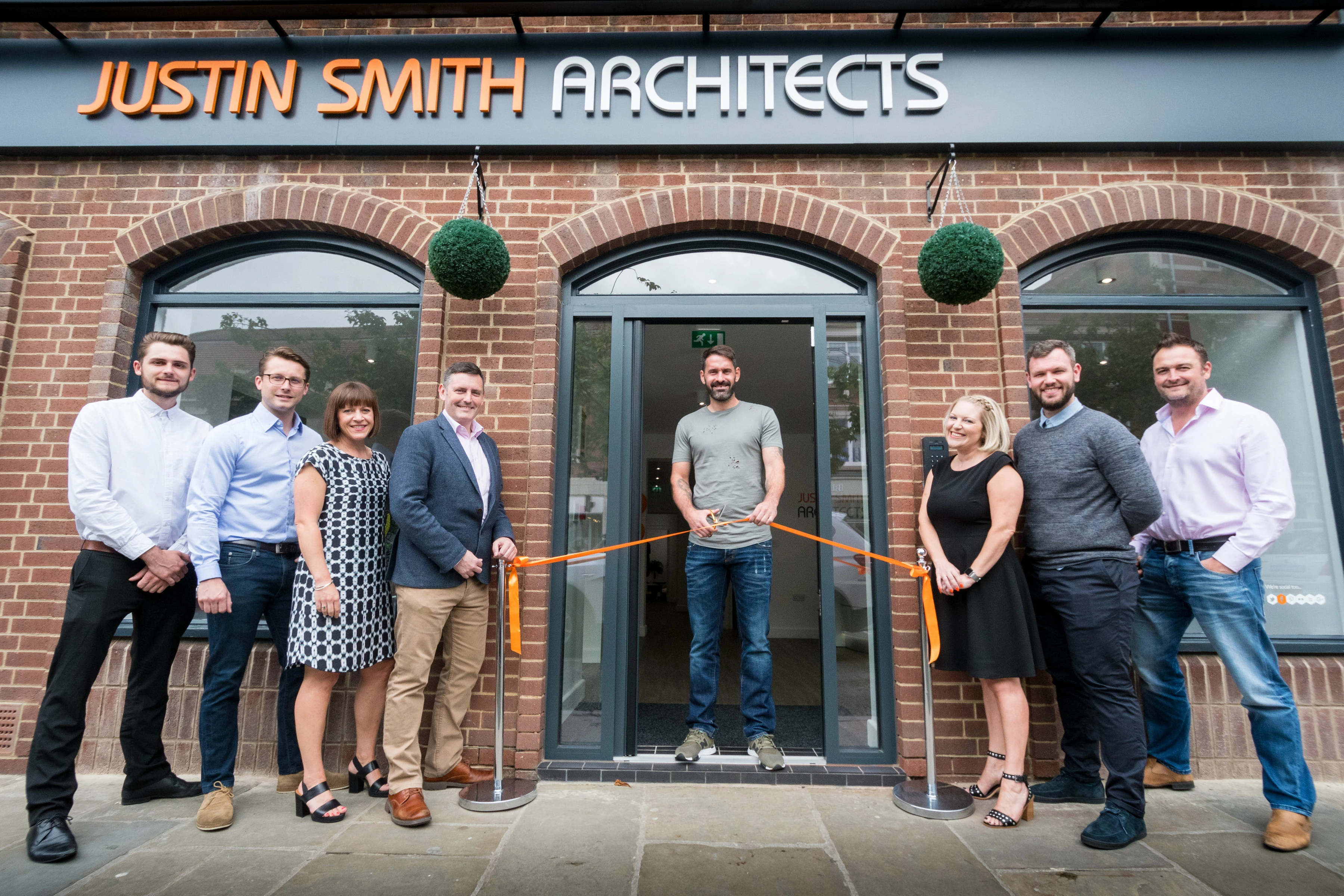 Scott Carson cuts ribbon at opening of Justin Smith Architect's new city centre base