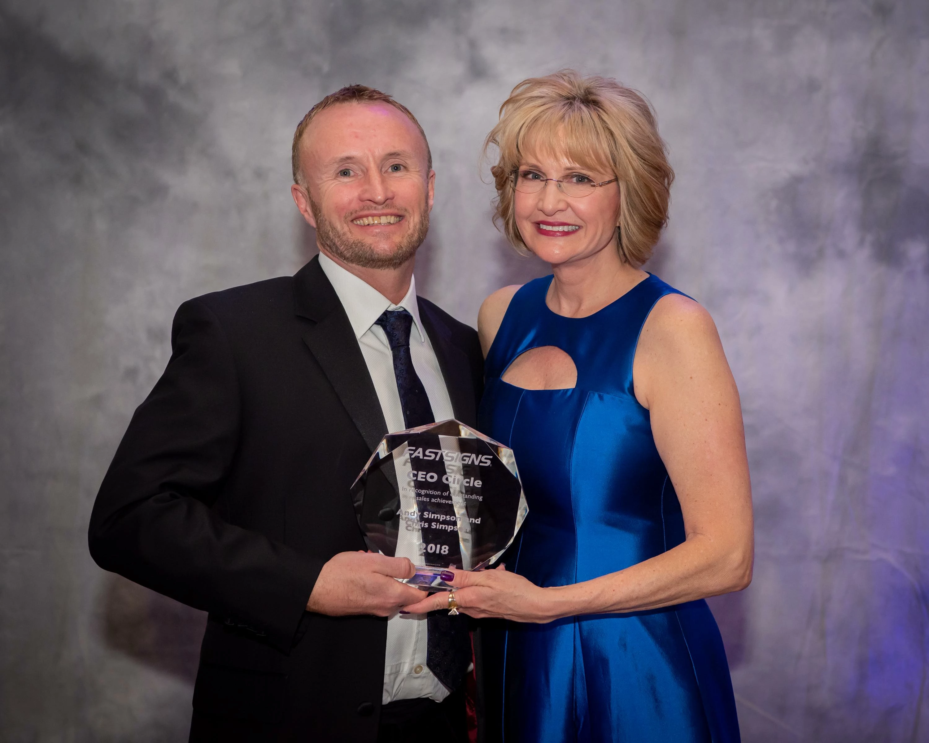 Andy Simpson (left) owner of FASTSIGNS Leeds, with FASTSIGNS' global CEO Catherine Monson (right) at the FASTSIGNS 2019 international convention