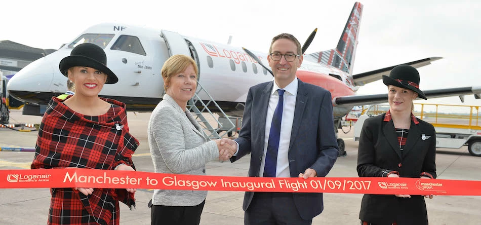 Loganair’s Kay Ryan (centre left) and Manchester Airport’s Julian Carr (centre right)