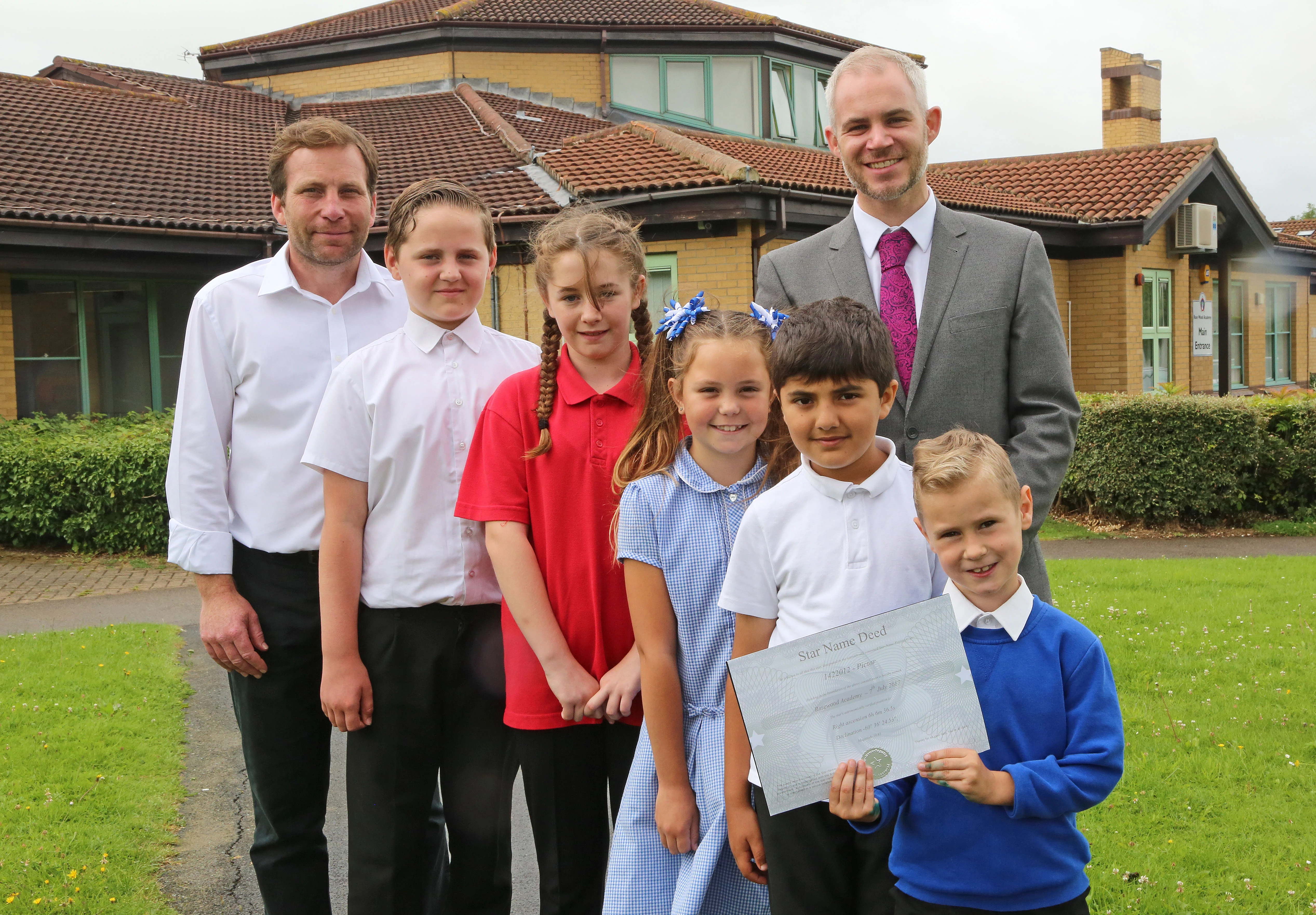 L-R Head teacher - Paul Cowley, Louie Fearnewough, Ruby Mai Burnicle, Mohamed Dahafr and Tom Shields and Steve Balls of Barratt. .JPG